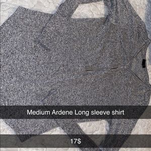 Medium Ardenes long sleeve shirt, it’s black and white with a zip in the middle